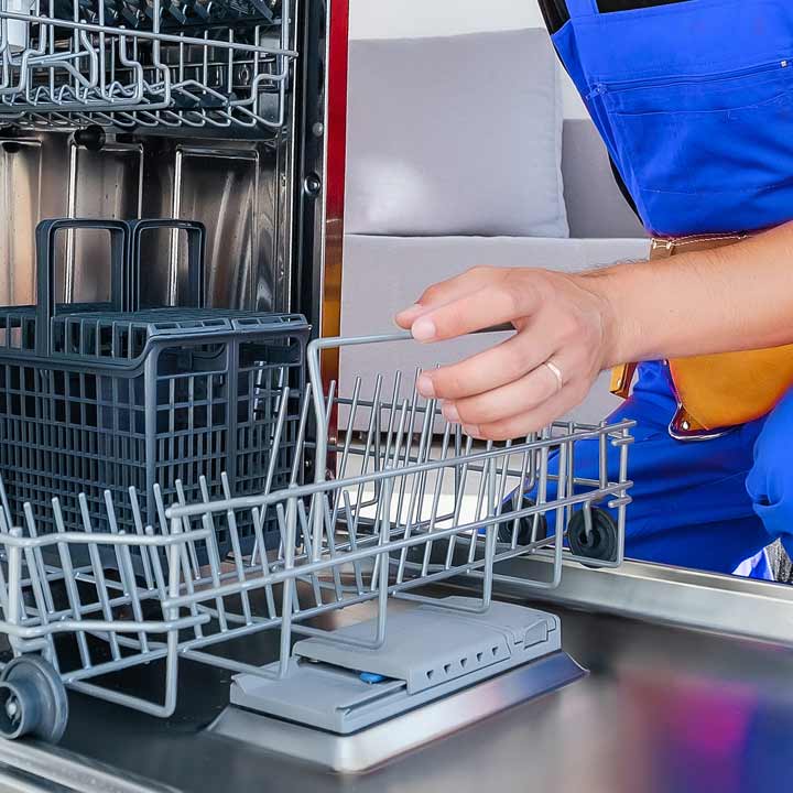 AppFix technician servicing a dishwasher